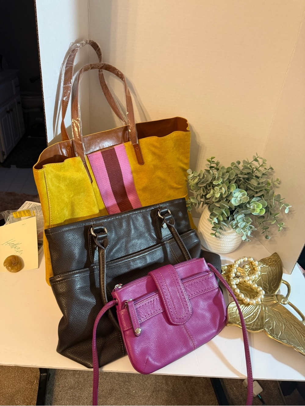 Tignatello brown and magenta bundleLeather with gold tote bag.